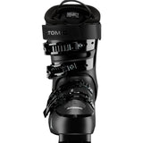 A close-up studio shot of a black Atomic Select ski boot, showing the buckle system, ankle strap, and lower shell.