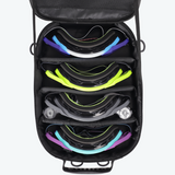 Black case with colorful ski goggles inside on a white background