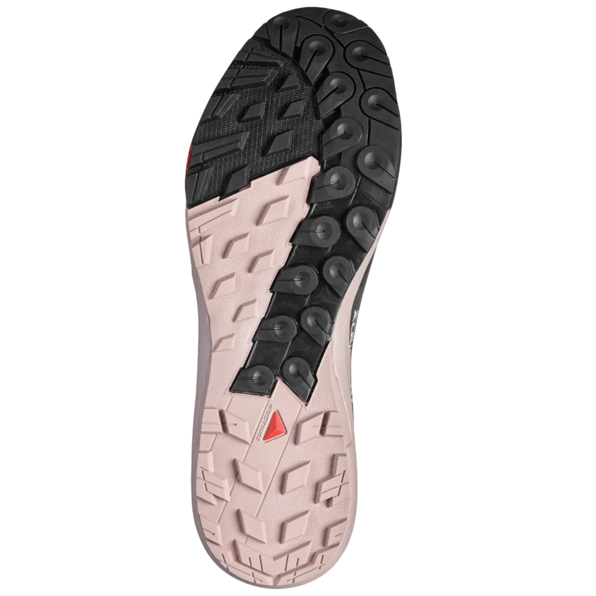 The outsole of a trail running shoe, showing a black treaded section on the heel and a light pinkish-beige section on the forefoot with a small red triangular logo.
