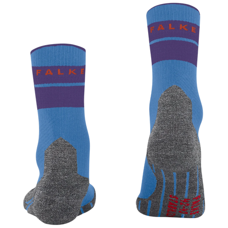 A pair of Falke crew socks shown from the front and back on a plain white background. The socks feature a light blue base with a dark purple band, a gray knit heel and toe area, and red brand lettering.
