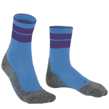 A pair of crew-length athletic socks in light blue with dark purple stripes near the cuff and heather gray heels, toes, and soles, shown on a plain white background.