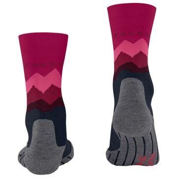 A pair of FALKS crew socks shown from both the front and back views on a plain white background. The socks feature a magenta and pink mountain pattern on the upper leg, a dark navy blue lower section, and a heather gray toe and heel area.