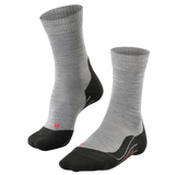 Pair of gray and black socks on a white background