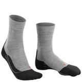 Pair of gray socks with black toes and heels on a white background